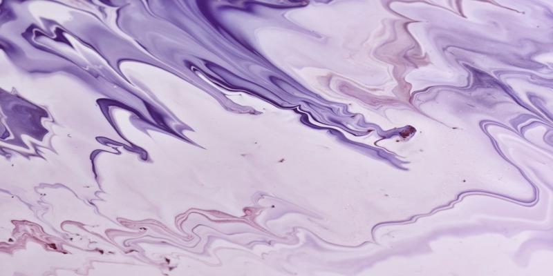 A close up of purple and white paint
Description automatically generated